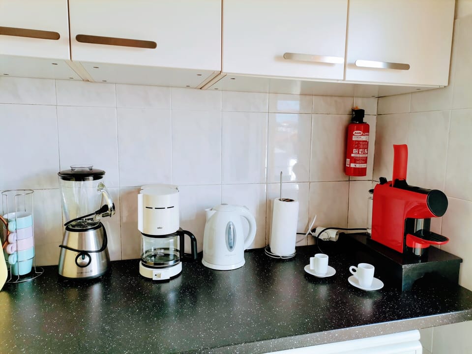 Zona das máquinas e cantinho café