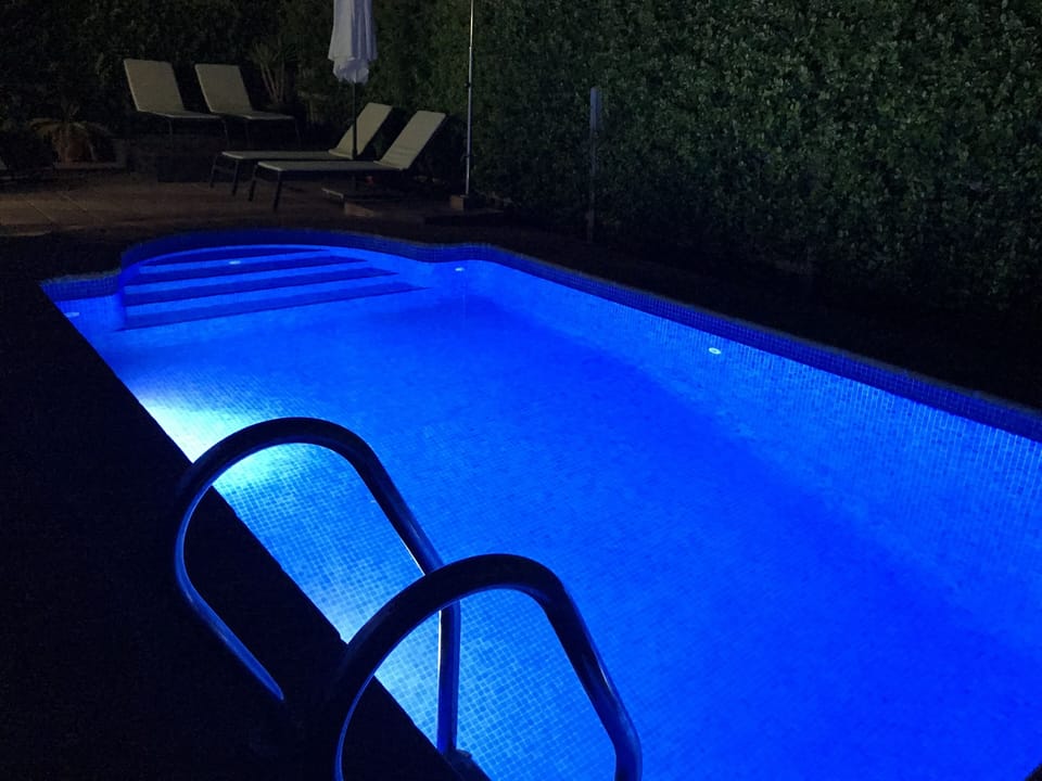 LED pool lights with remote control for easy operation by renters