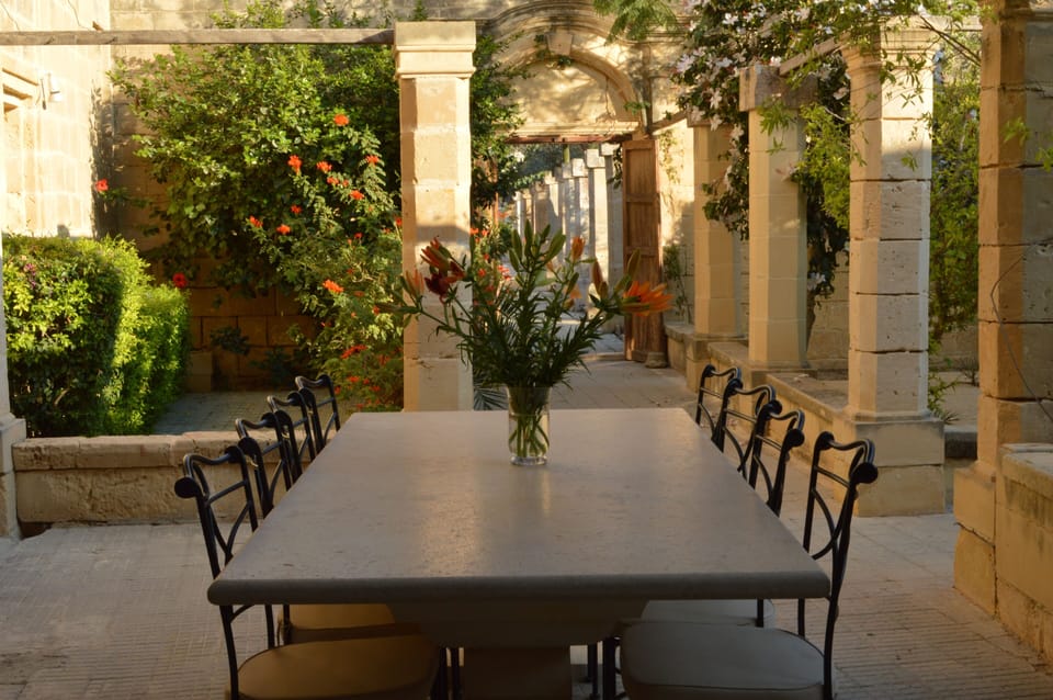 Outdoor dining table in inner courtyard