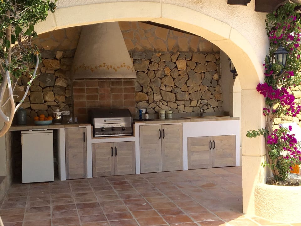 Outdoor cooking area with gas BBQ