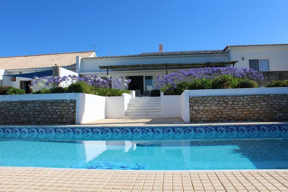 Lovely 8.5m x 5m Solar Heated Swimming Pool. Optional heat pump also available.