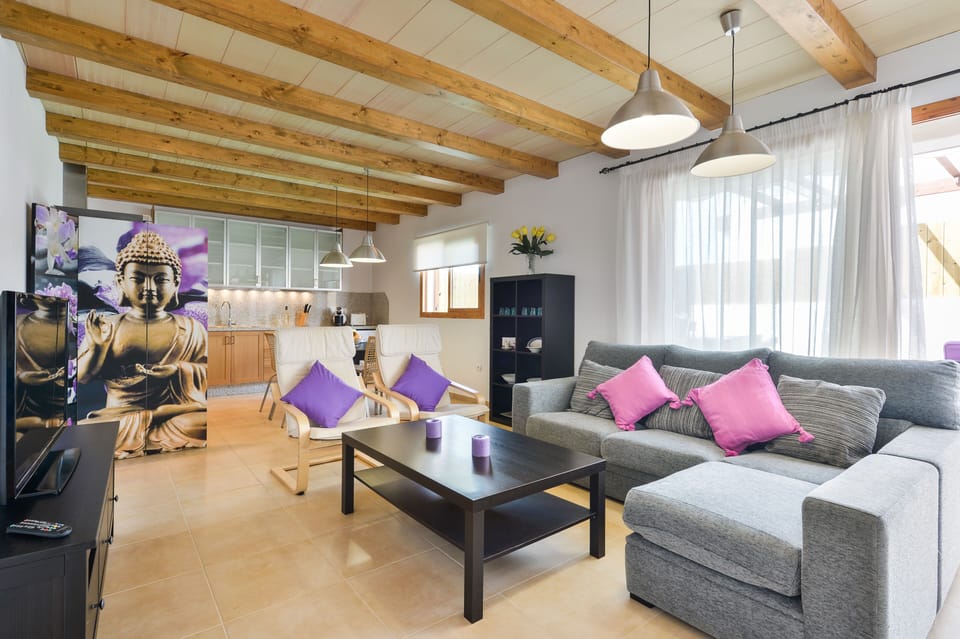 Bright, open plan living room with comfy sofa