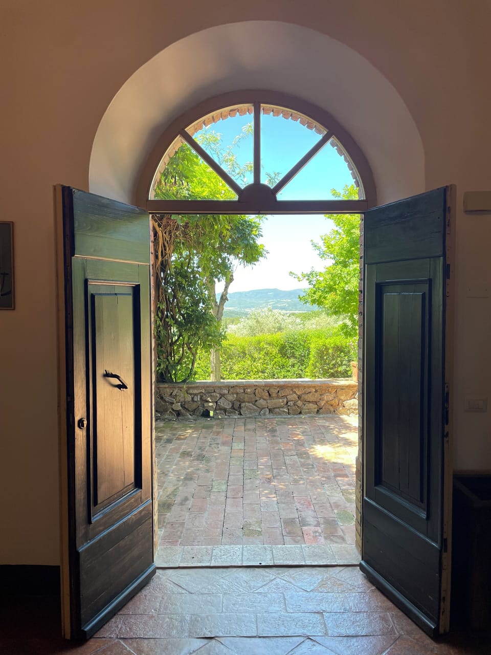 Main door on to terrace.The ground floor has 5 French windows on to the terraces