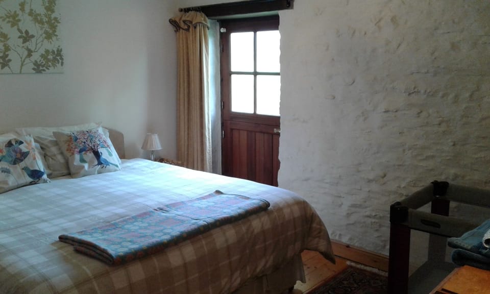 Bedroom with travel cot