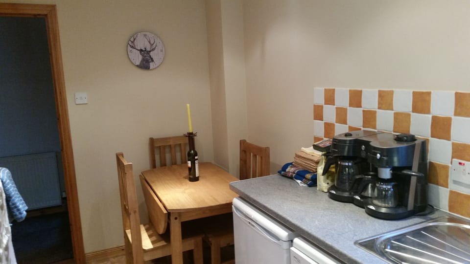 Dining table will sit four.  Fresh coffee!
