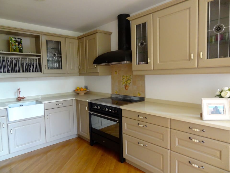 Open plan Provençale-style kitchen - Smeg oven/cooker & American fridge-freezer