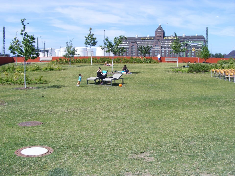 Sunbathing area with playground just opposite the house