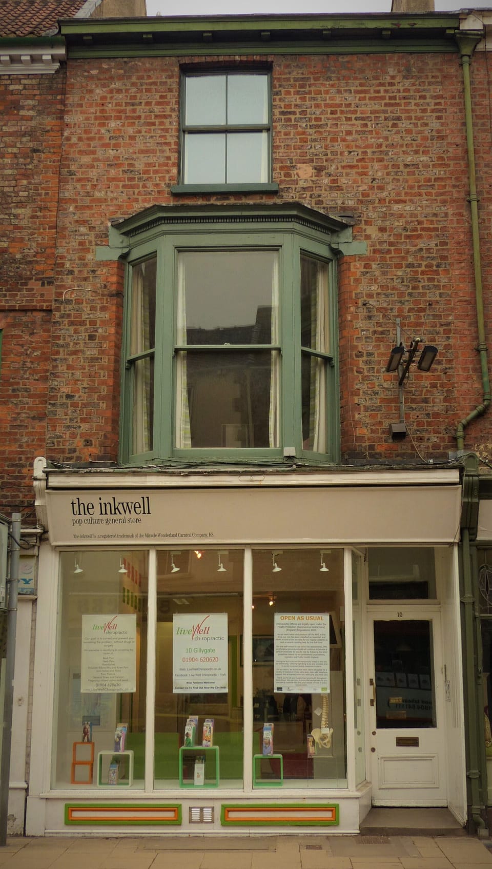 Our bay window is great for people watching. Downstairs is a quiet chiropractors