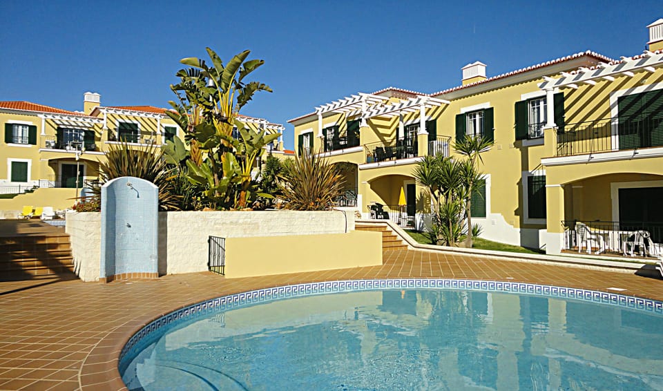 Children's Pool, our Our Apartment is Top Centre of Photo.
