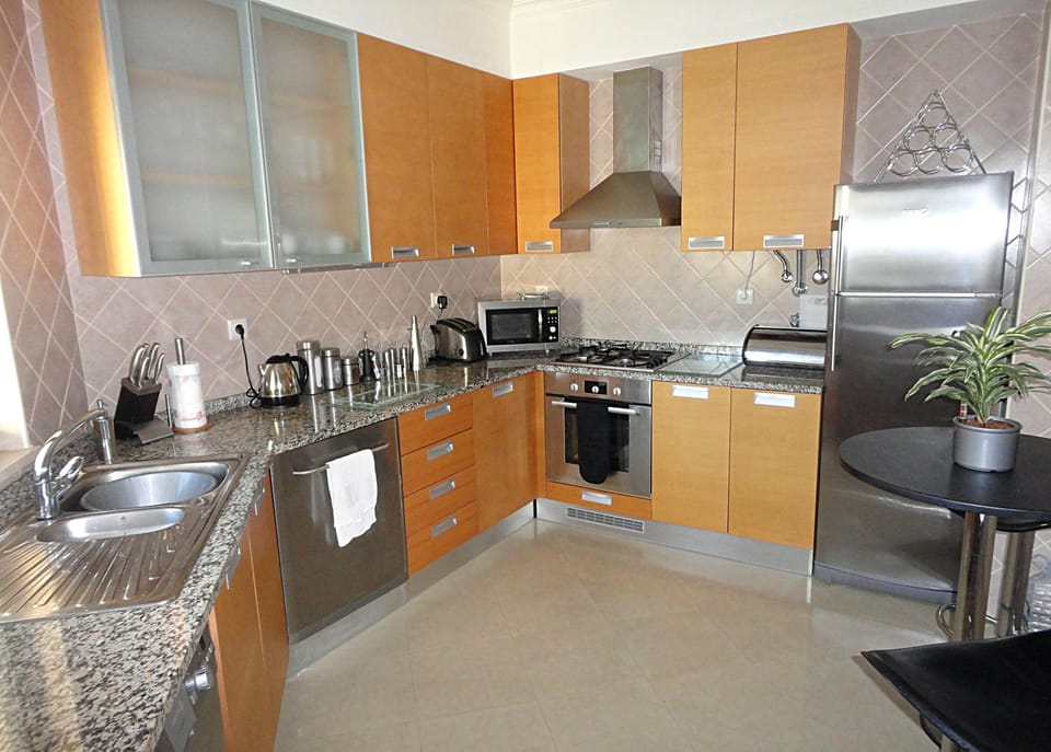Full equipped kitchen with Dish washer, washing machine and microwave