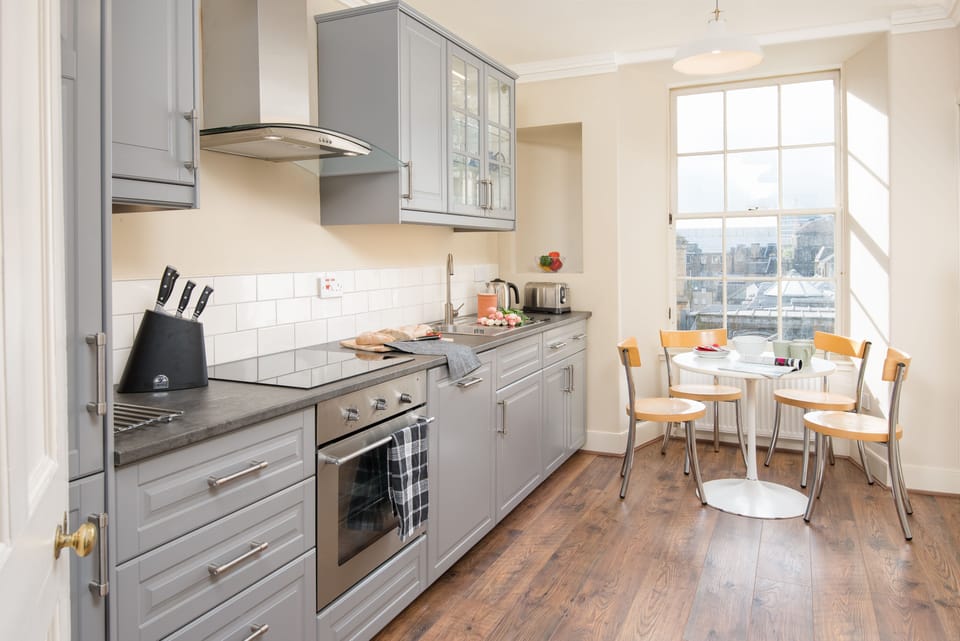 Well-equipped kitchen with views across the Edinburgh skyline