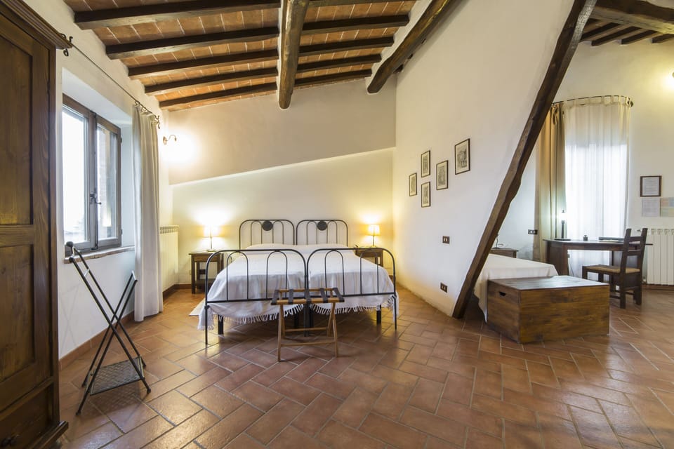 Large double room with open space, living room and kitchen corner