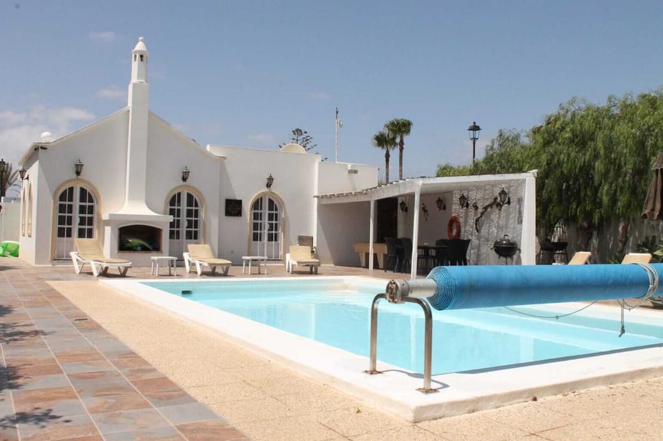 View of Villa Paradise, Pool, Sunbeds and Outdoor Seating Area