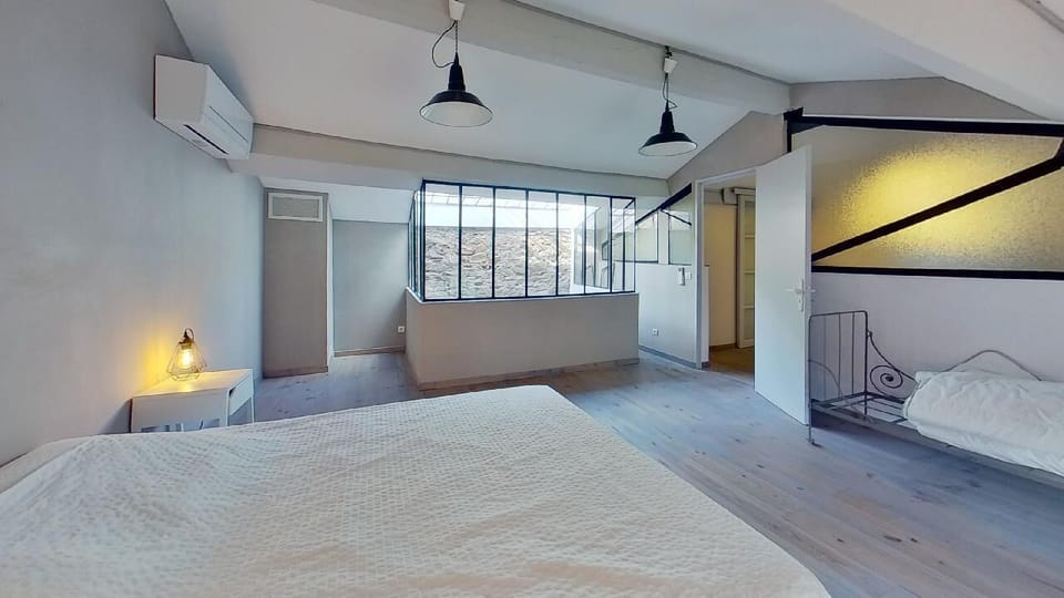 The master suite, with dressing room, en- suite, linked study with sofa bed