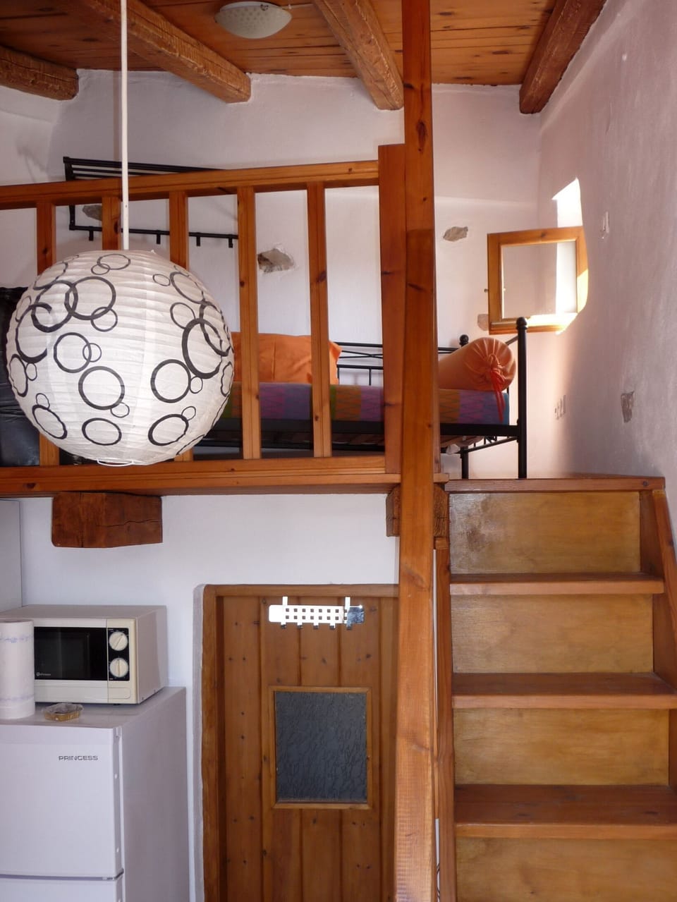 Steps up to the mezamine bedroom