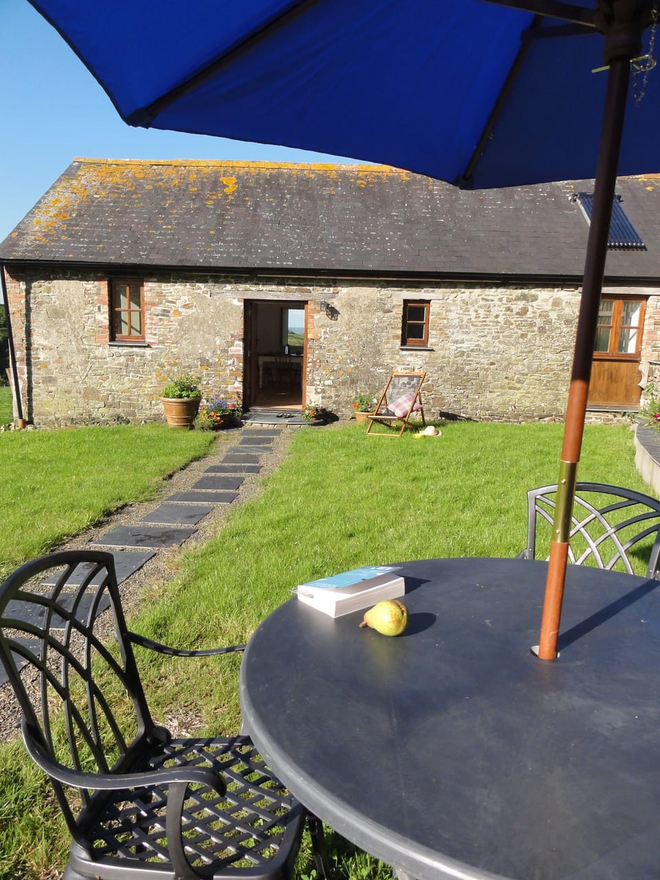 The Shepherd's garden. South facing with a lovely slate garden table. 