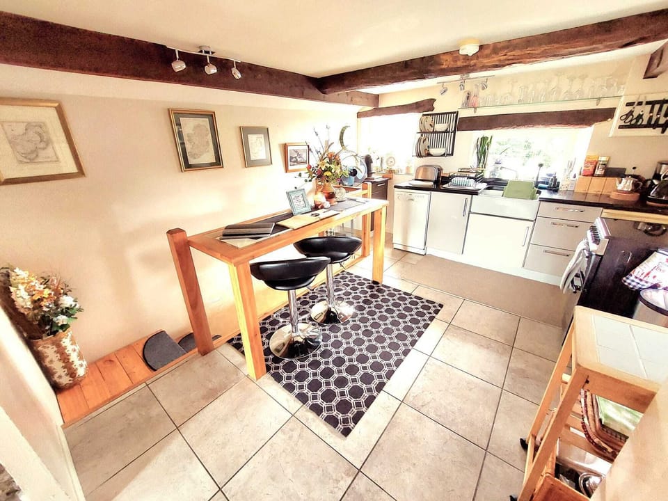 Step down from the dining area  to the stairs to the  ground floor hallway