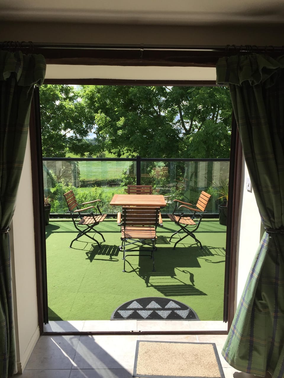 Living room double glazed door opened to balcony