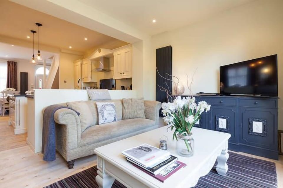 Comfy sofa with 40" tv and dvd unit including a wide range of dvd's