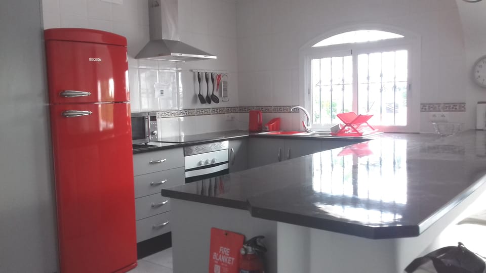 Fitted kitchen with 'retro' fridge/freezer