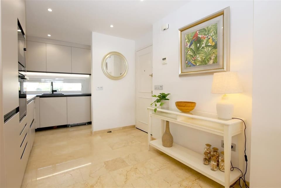 Entrance and modern kitchen area 