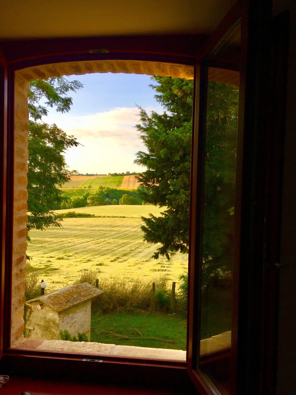 View from our bedroom window upstairs across the fields ❤️