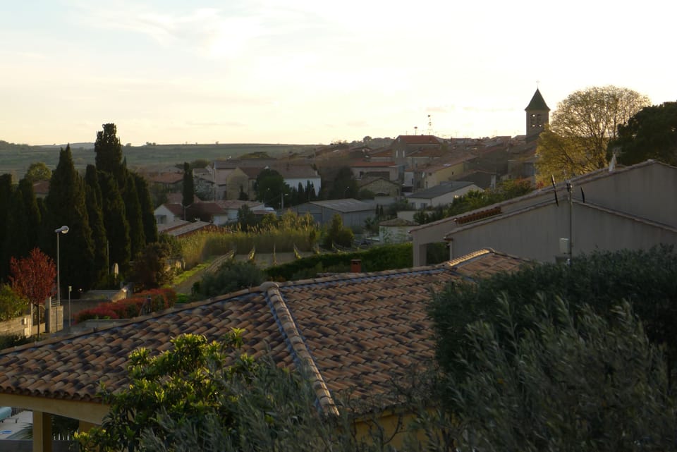 Sunset view towards the village from roof terrace