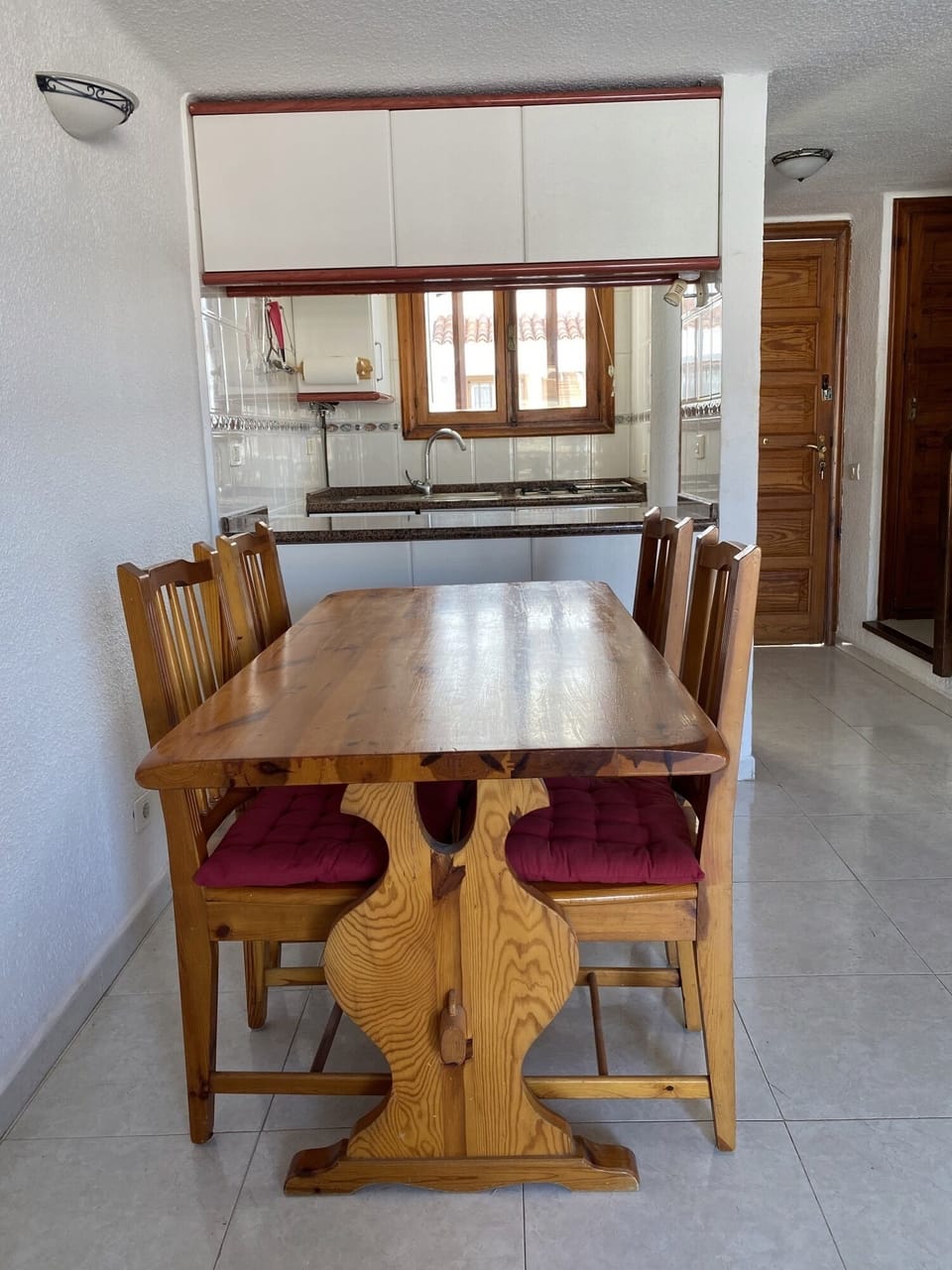 Dining table seats four people.