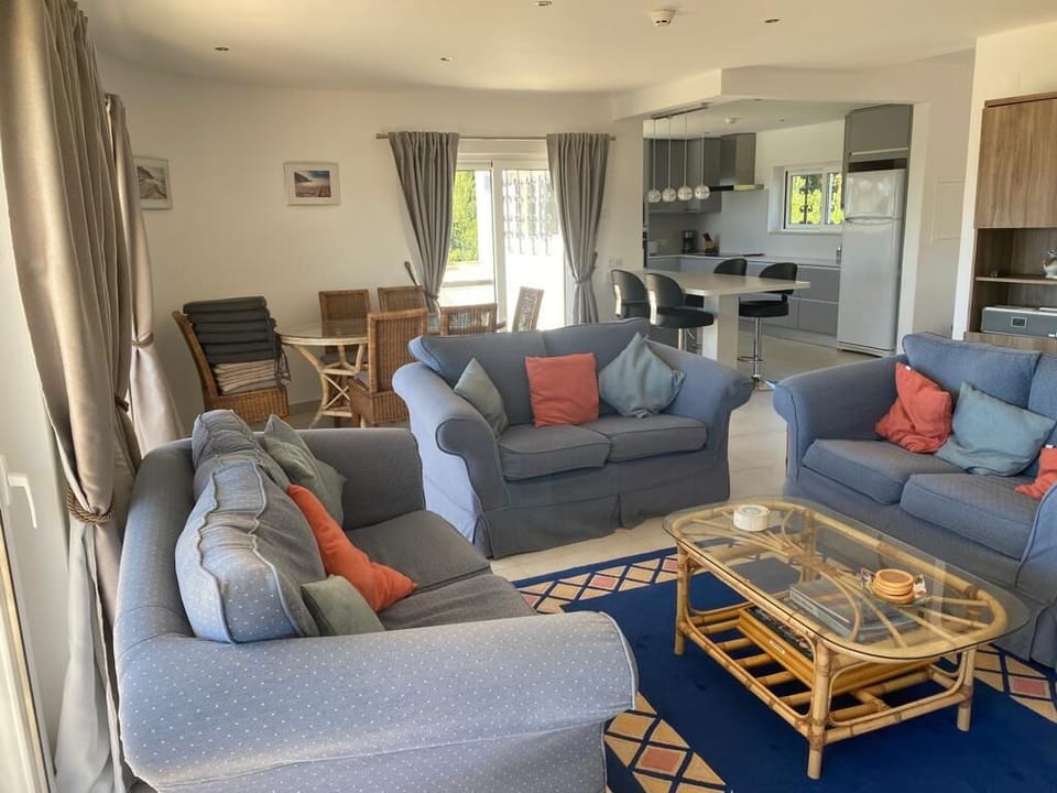 The Lounge with the kitchen in the background