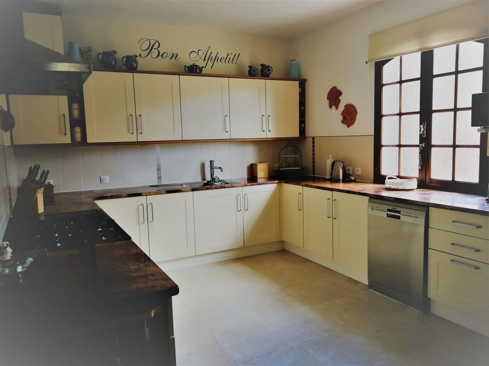 Fully equipped kitchen for your use with many amenities.
