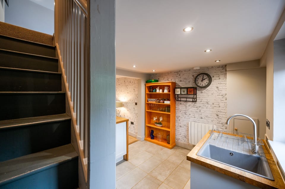 Ground floor: Kitchen and stairs to first floor