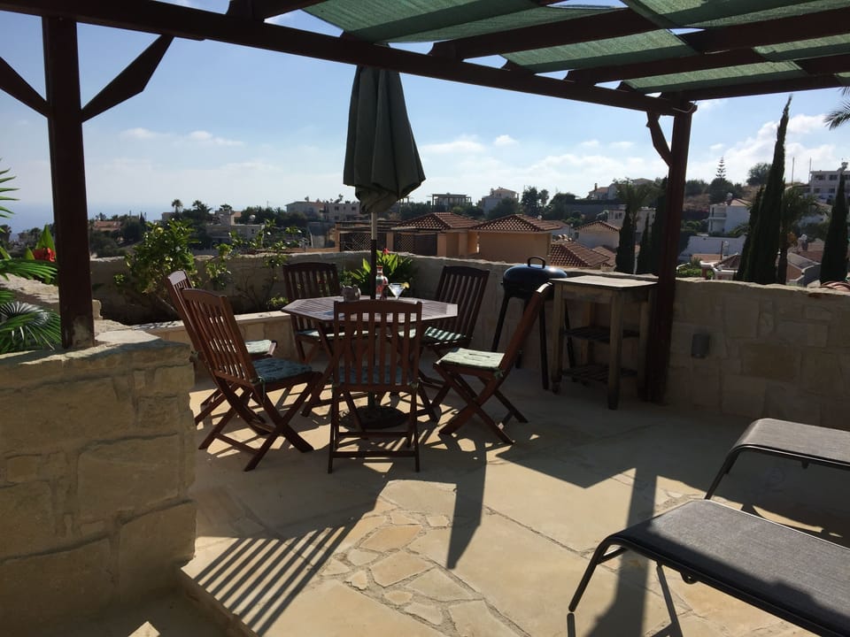 Private roof terrace and garden with views to the hills where you watch sunsets