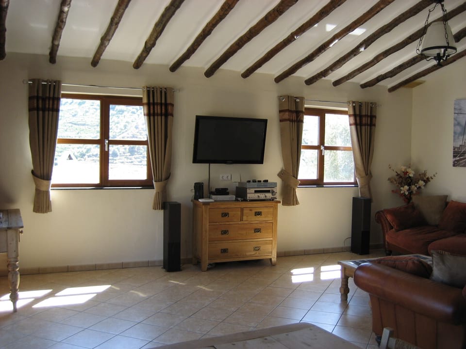 Large lounge with patio doors leading to terrace