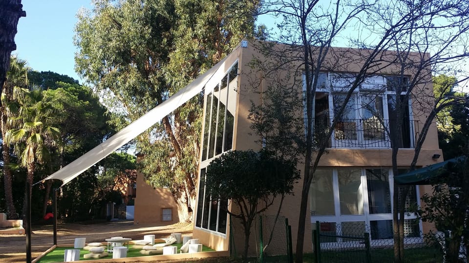 façade from the house and garden.