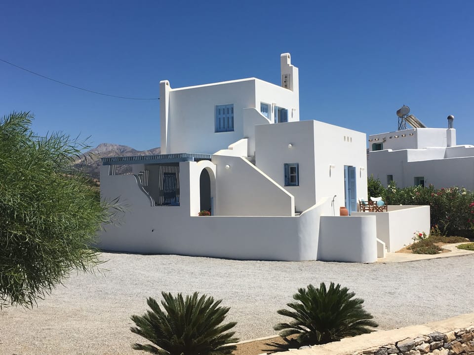 The side of the villa showing the ground floor covered terrace 