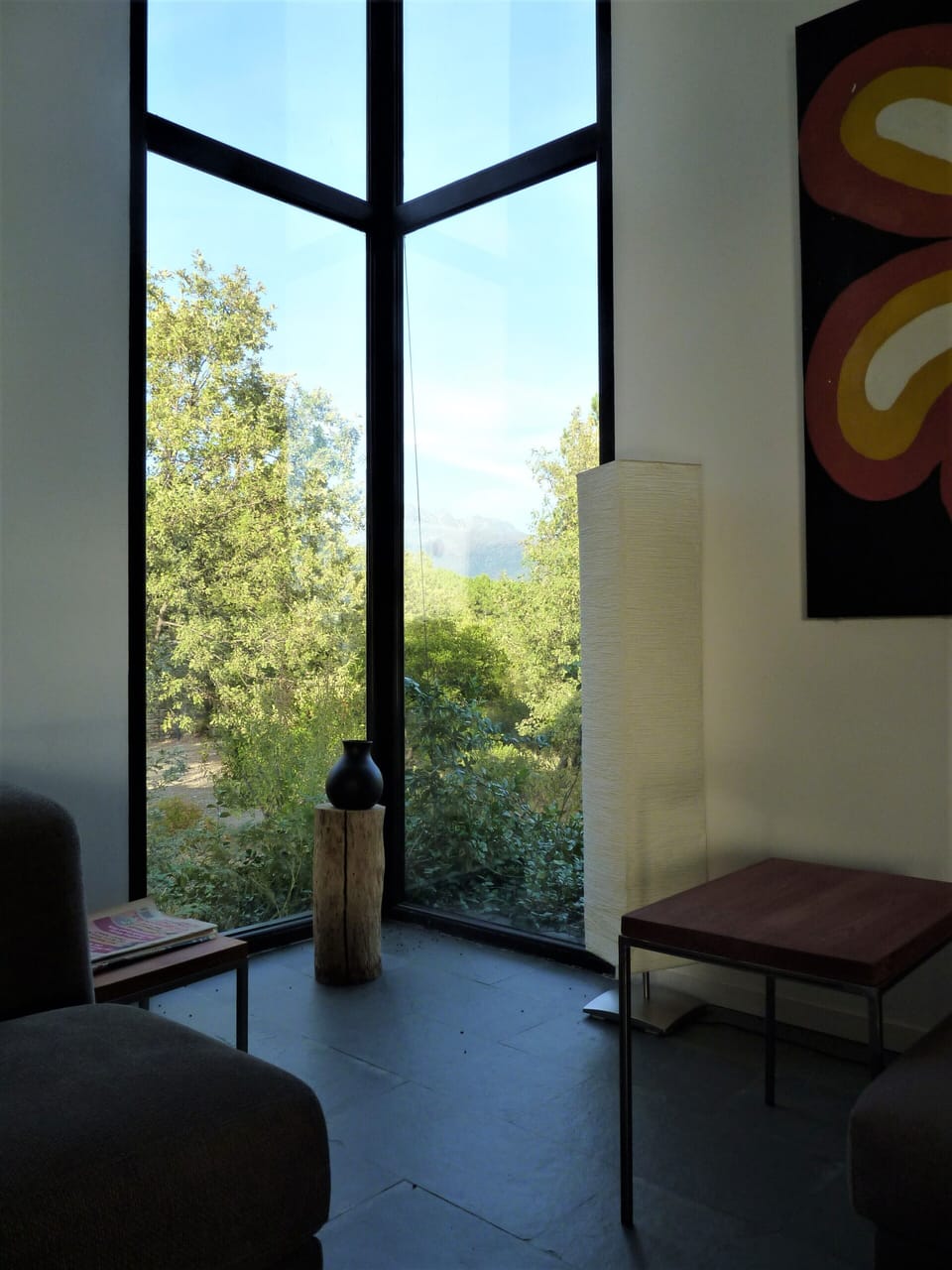Corner window with view of high mountain peaks