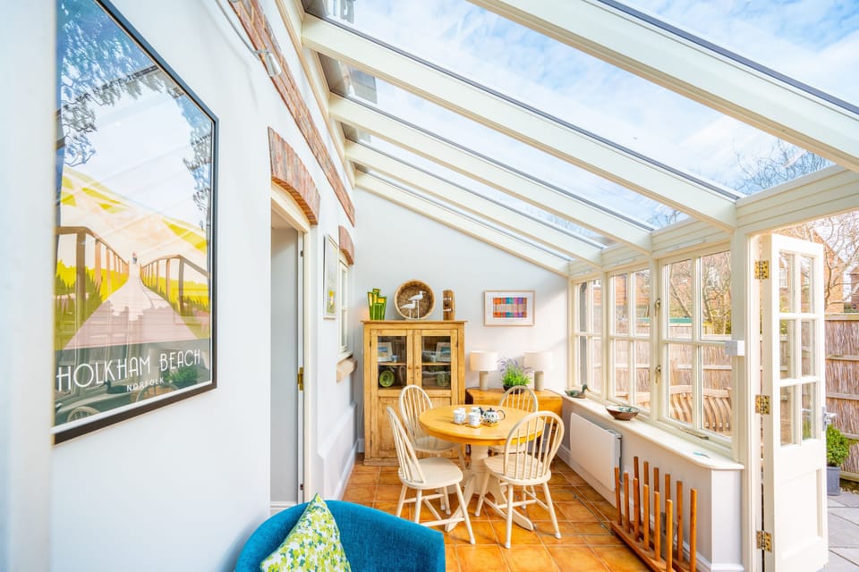 Ground floor: Conservatory with access to garden