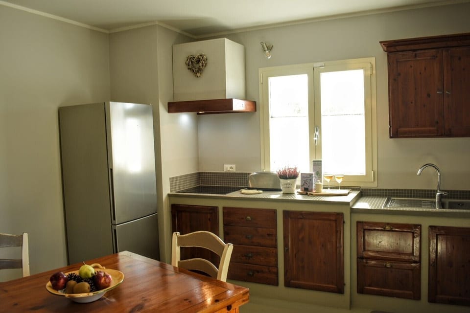 The kitchen/ dining room has everything you need for a comfortable stay