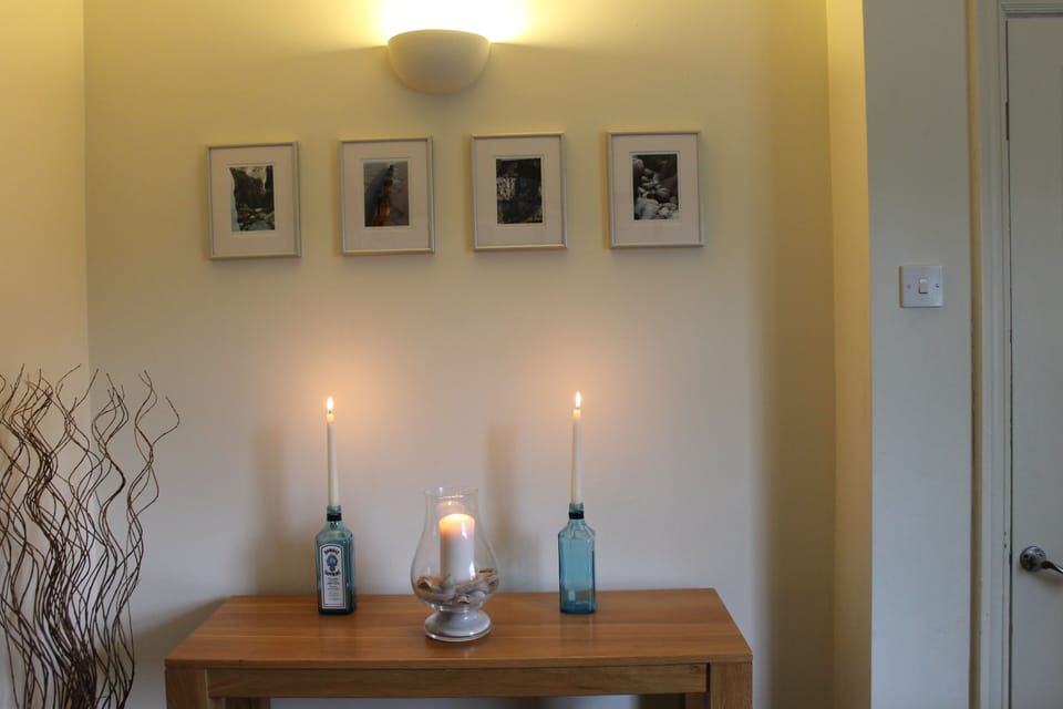 Shelves and pictures in the sitting room.