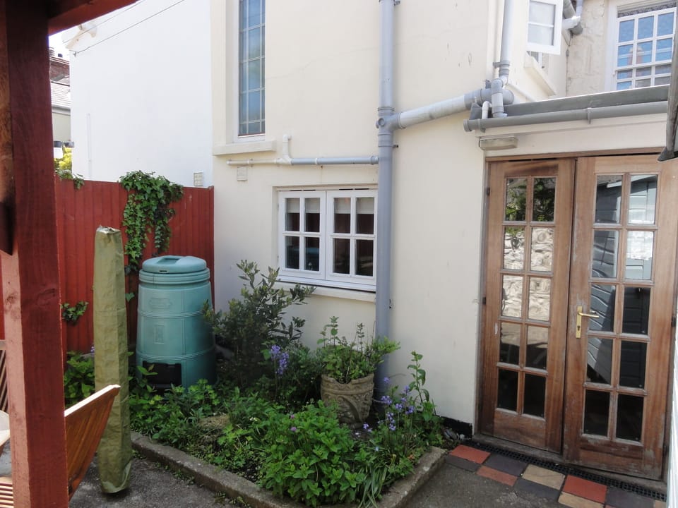 Patio doors leading from kitchen to small patio area.