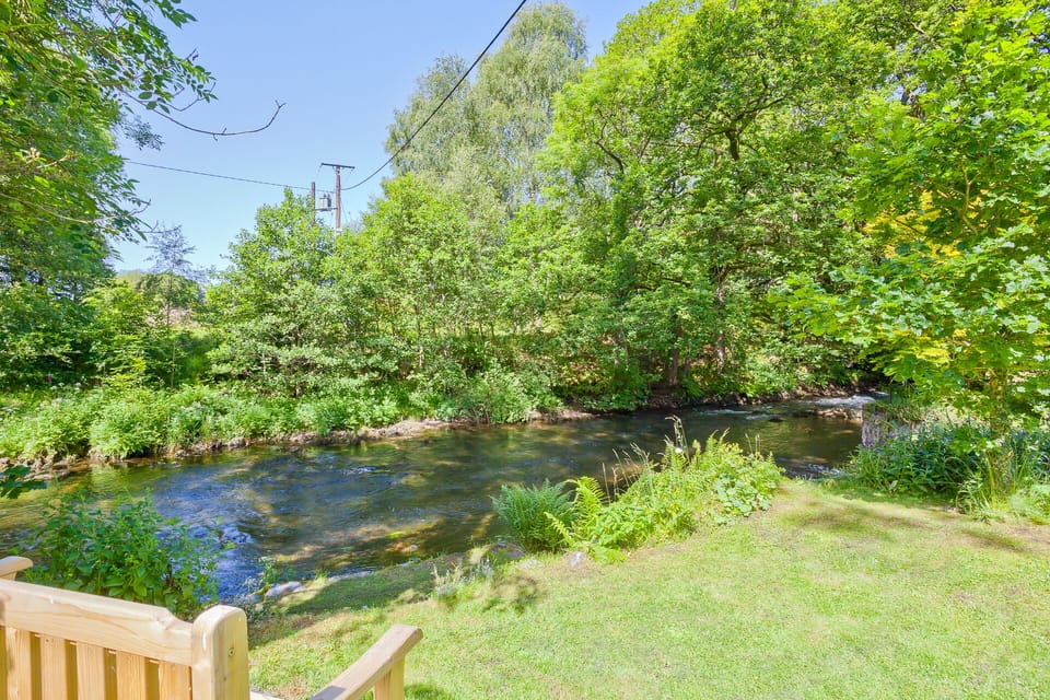 Our garden bench by the River Crake