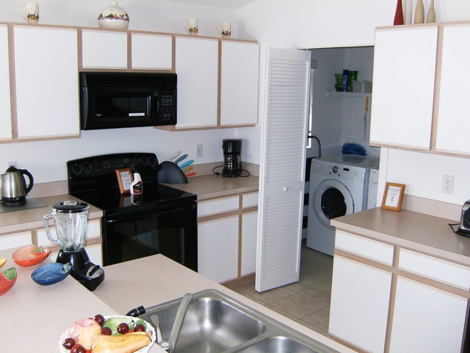 Kitchen area with Utility in the background
