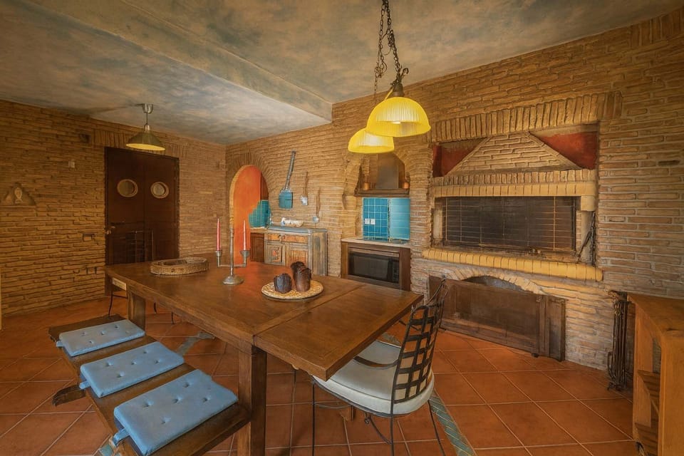 Charming rustic kitchen with stone walls