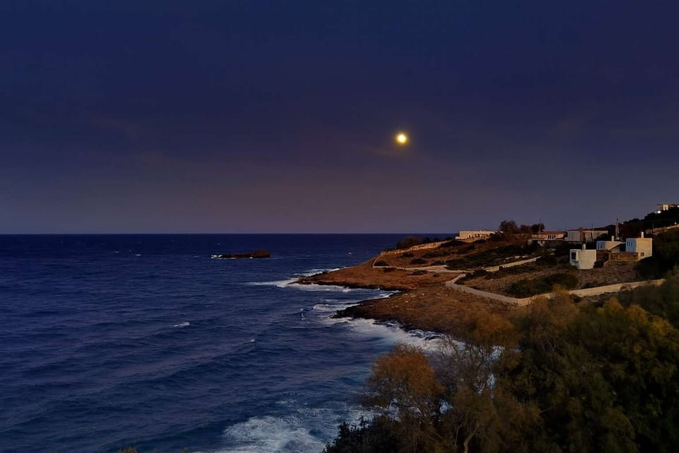 Moonlit view of the sea and coastline