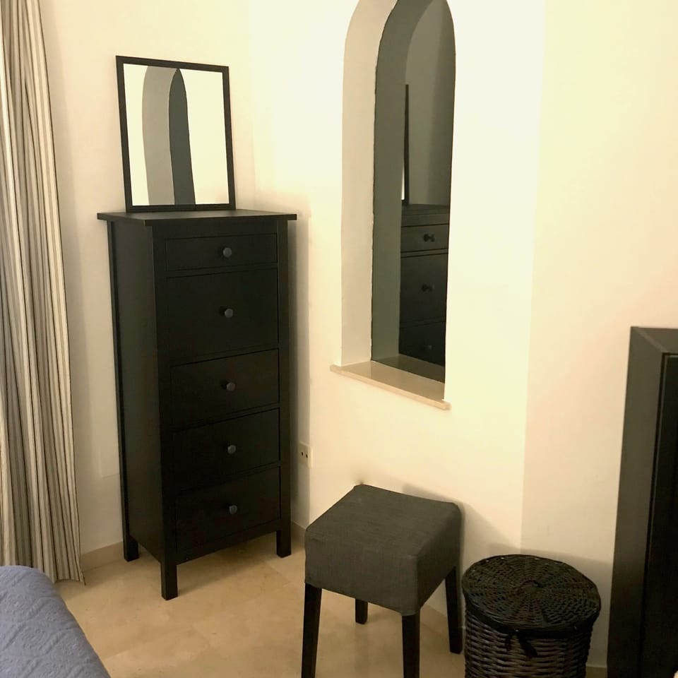 storage and dressing area in the second bedroom.