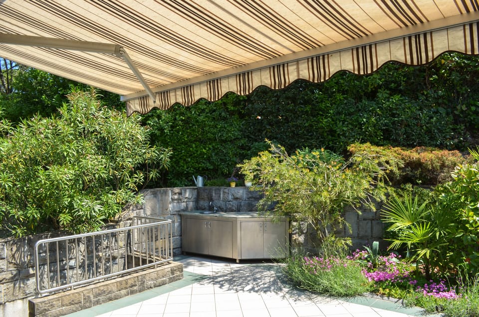 Private terrace with garden and summer kitchen