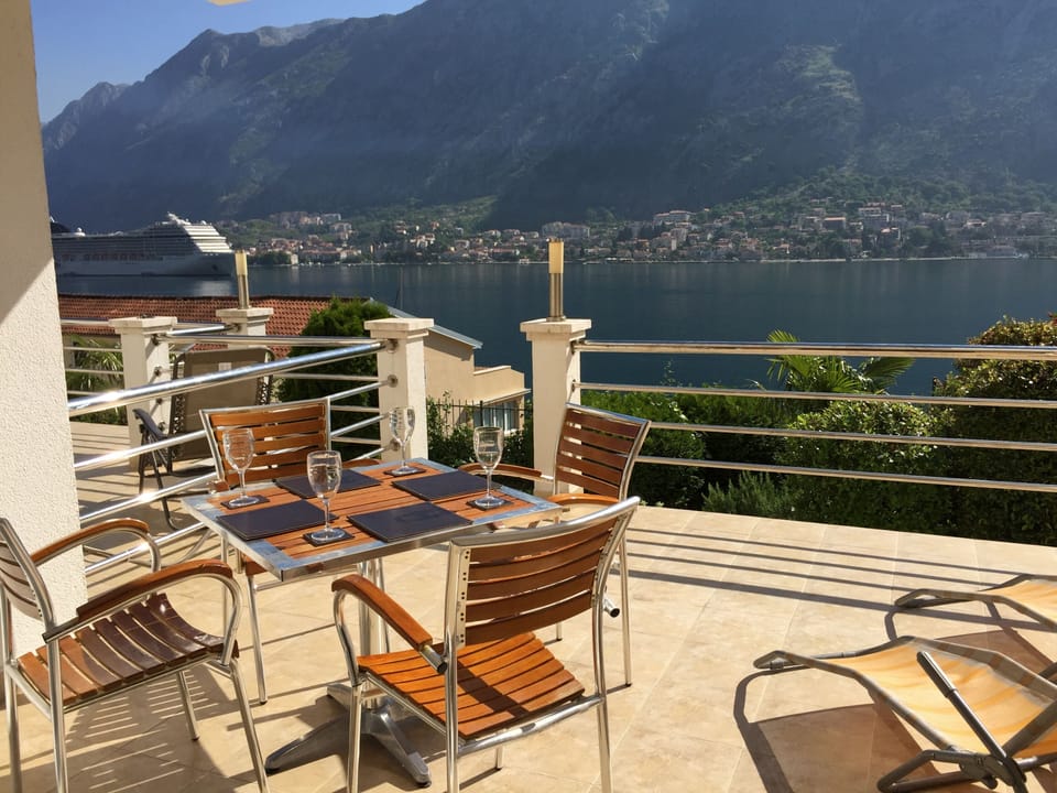 Cruise ship on the fjord from the terrace