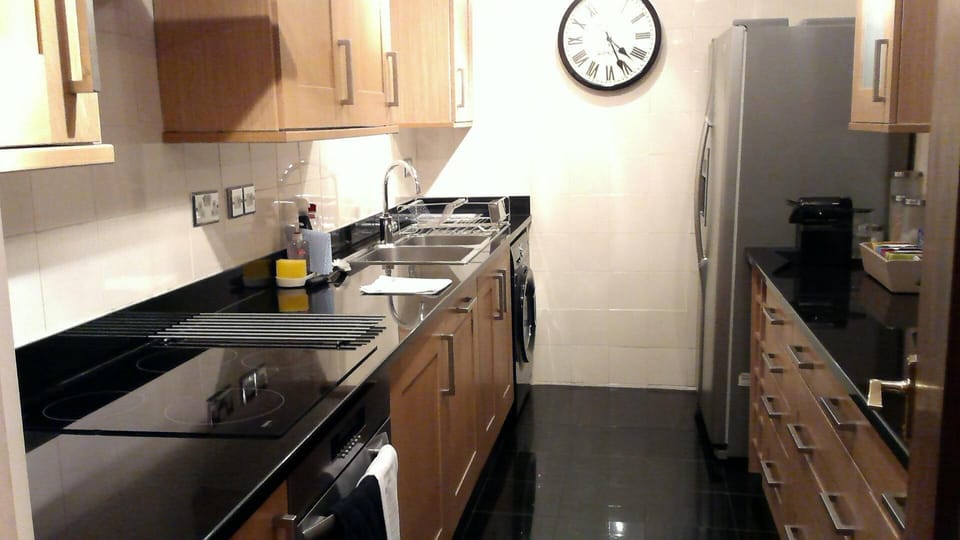 Fridge freezer with ice.  Oven, hob, pots, pans & full range of utensils.