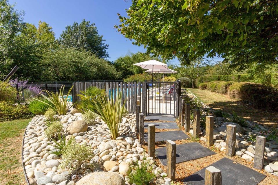The pool is fenced and gated.