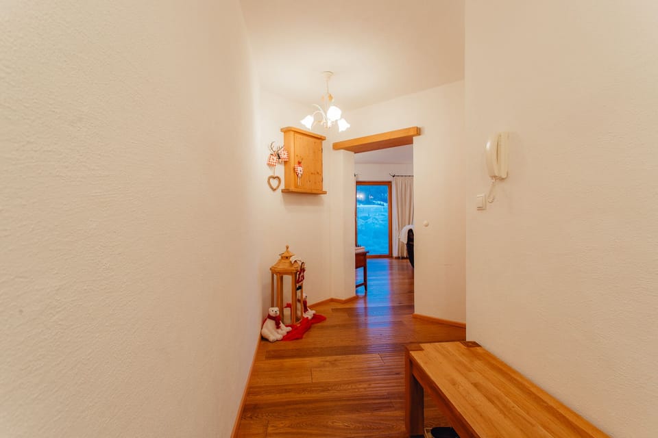 large hallway with storage and area for ski clothing/jackets etc 